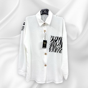 camicia bianca con dettagli...